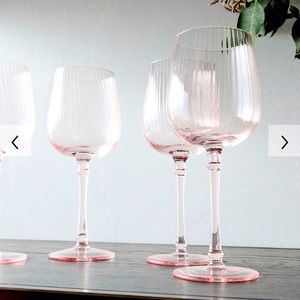 Pink fluted wine glasses